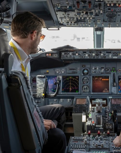 A pilot in cockpit.