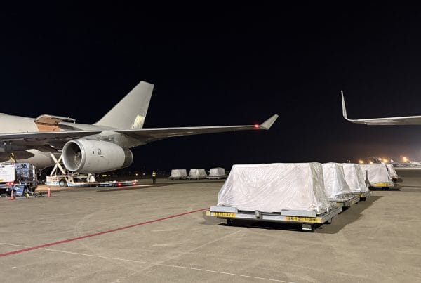 Cargo pallets are waiting to be loaded to the aircraft.